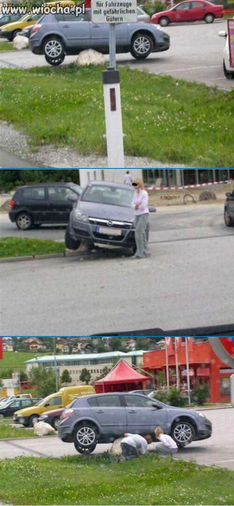 Kobieta samochód i kamień