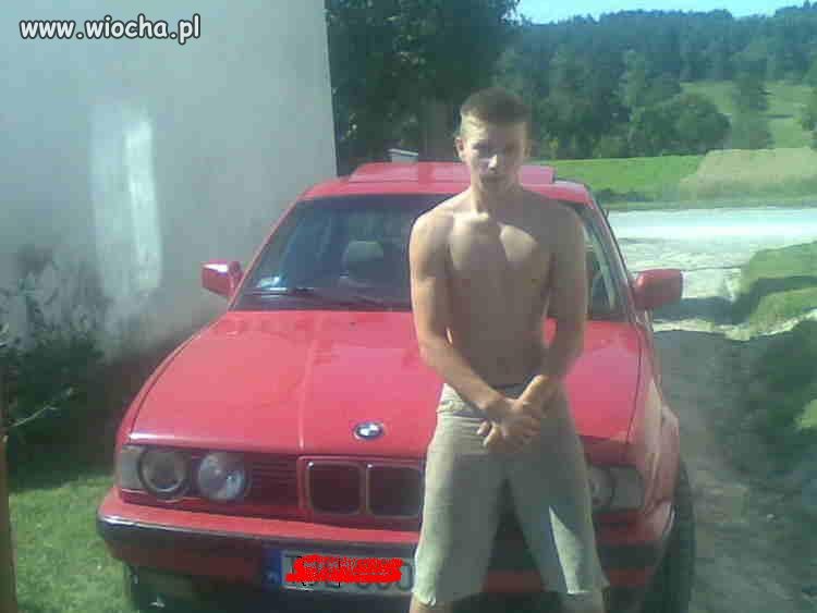 Wiejski kozak przy BMW..