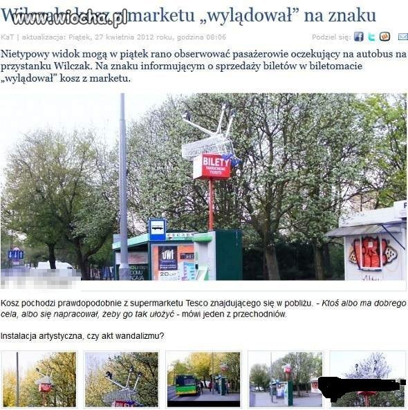 Wózek z Tesco na słupie od przystanku 