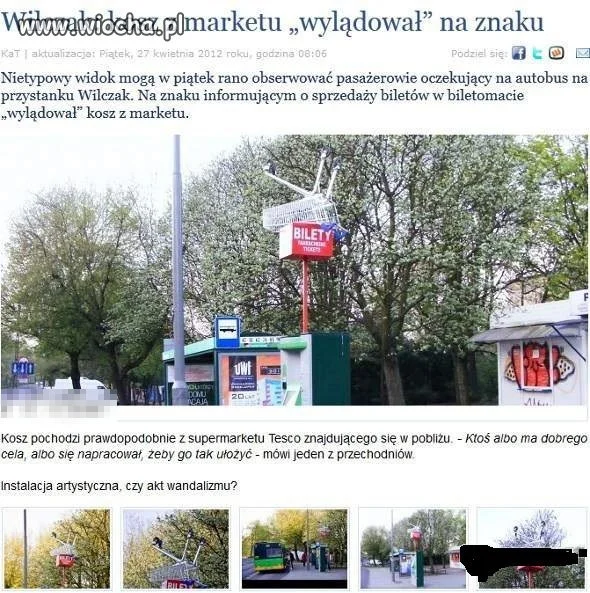 Wózek z Tesco na słupie od przystanku 