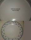 Wiem na czym jem . Made in China .Napis na talerzu
