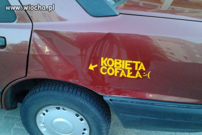 Kobieta cofała...