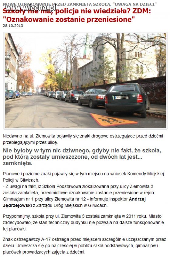 Znak "uwaga dzieci" przed zlikwidowaną szkołą