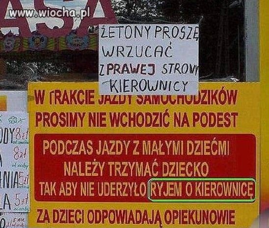 W taki ryj to powinien dostać autor tabliczki