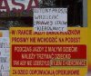 W taki ryj to powinien dostać autor tabliczki