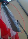Polska flaga przyozdobiona workiem na śmieci