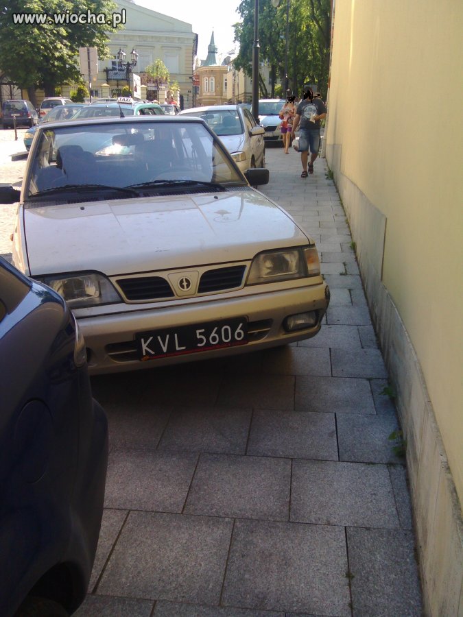 Karny k...s za ch...e parkowanie
