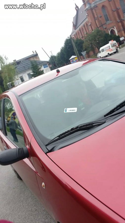 Naklejka na przednią szybę.