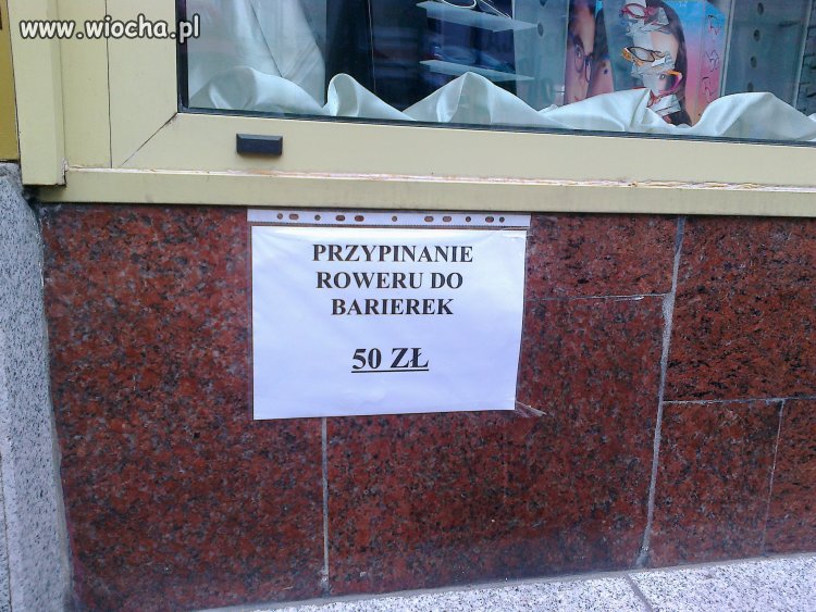 Przypięcie roweru do barierki