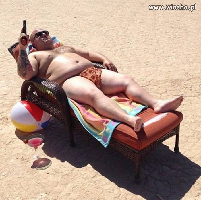 Pół* Janusza na plaży 