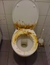 Co oznacza znaczek trójkąta na toalecie?