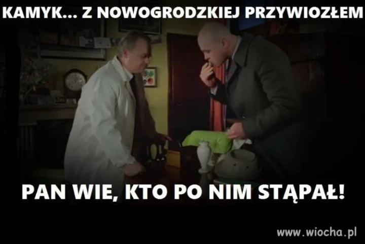 Trzymając w ręku