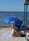 Oto, gdzie pojawia się fraza: Piec swój tyłek na morzu.
