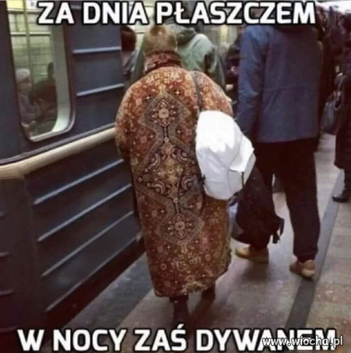 Za dnia płaszczem...