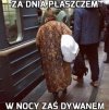 Za dnia płaszczem...