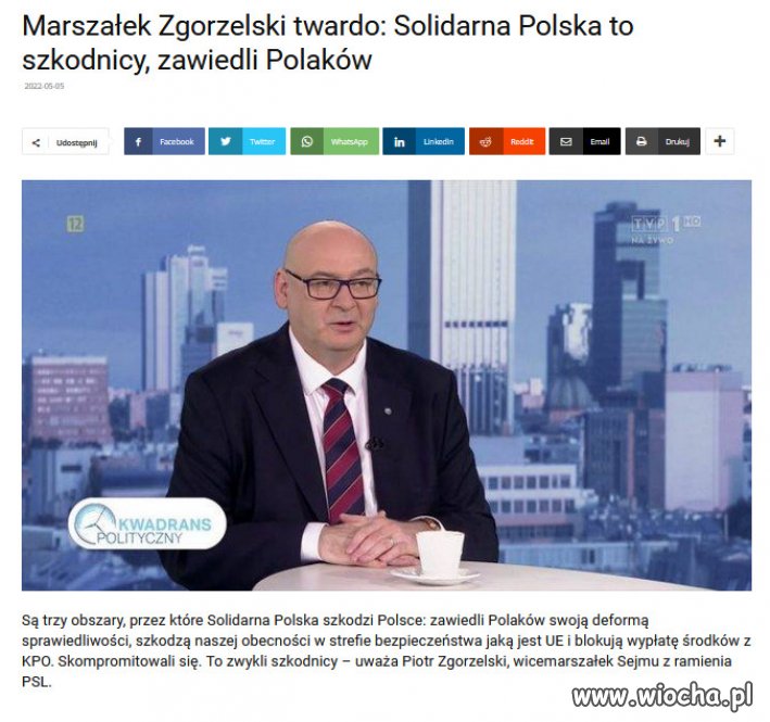 Za Solidarną Polską , stoi Tadeusz Rydzyk.